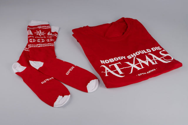 Pack de productos“Nobody should die at Xmas" Camiseta y Calcetines