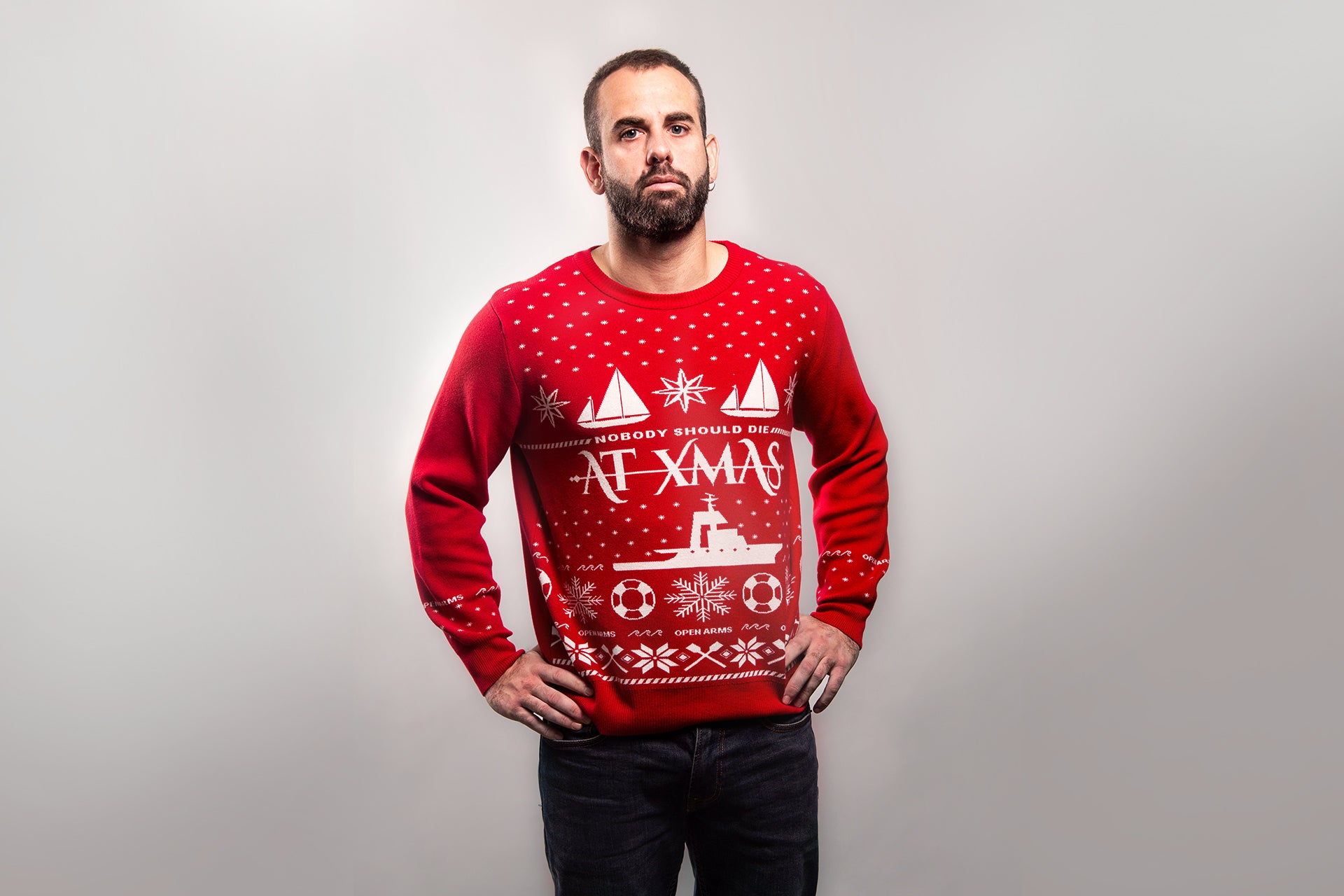 Christmas jumper “Nobody should die at Xmas”.
